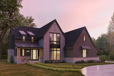 Mid-sized transitional stone and board and batten house exterior idea in Chicago with a mixed material roof