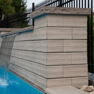 Rectangular Pool with Sheer Descent Water Wall & Automatic Safety Cover — Estate