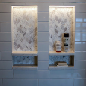 Luxury Spa Bathroom with Natural Warm Vanities, Quartz Countertop, Tiled Shower