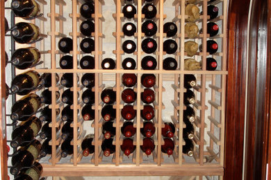 Inspiration for a timeless wine cellar remodel in Houston