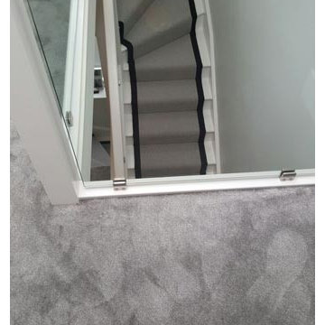Grey Carpet with a Black Border to Stairs