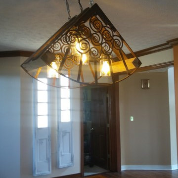 Custom Barnwood backsplash, kitchen accents, door and lighiting