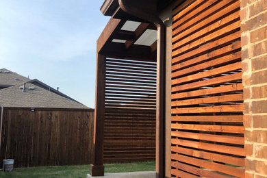 Pergola with privacy wall