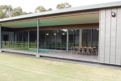 Photo of a modern home design in Perth.