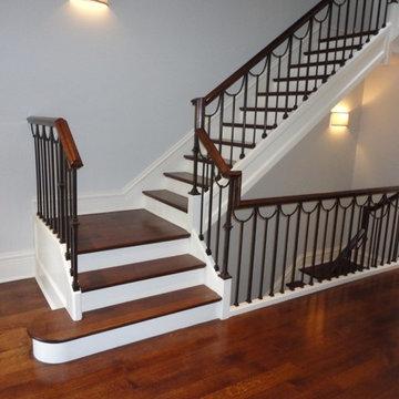 Straight And Platform Stairs With Iron Balustrade