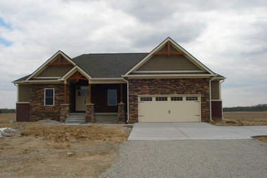 Mid-sized brown one-story mixed siding exterior home idea in Indianapolis