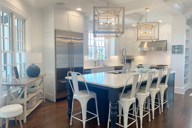 Example of a beach style kitchen design in Other