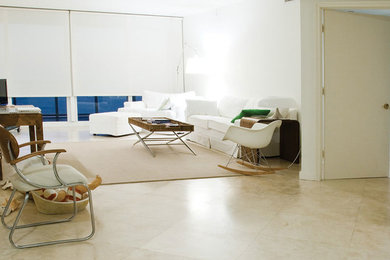 Example of a large trendy formal and open concept travertine floor and beige floor living room design in DC Metro with white walls