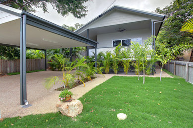 Photo of a traditional home design in Townsville.