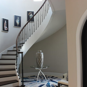 Curved Red Oak Stair with Single Basket & Twist Iron Balusters