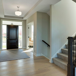 Photo of an eclectic foyer in Minneapolis.