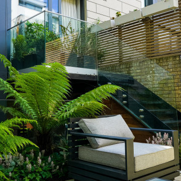 Stylish modern stairs in small urban garden