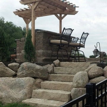 Paver Patio, Grill Enclosure, Outdoor Living Space, Rock Bubbler and Fire Pit