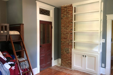 Inspiration for a mid-sized closet remodel in New York
