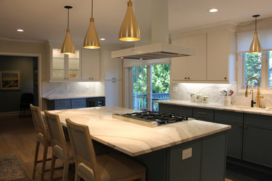 Example of a large transitional l-shaped light wood floor eat-in kitchen design in New York with an undermount sink, shaker cabinets, blue cabinets, quartz countertops, white backsplash, quartz backsplash, paneled appliances, an island and white countertops