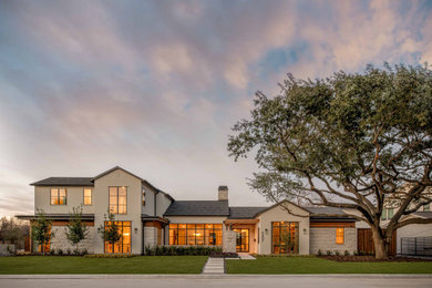 Example of a transitional exterior home design in Dallas
