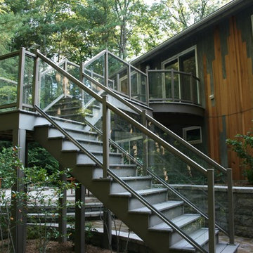 Upper Deck and Staircase with Glass Panel Railing