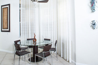 Dining room photo in Miami