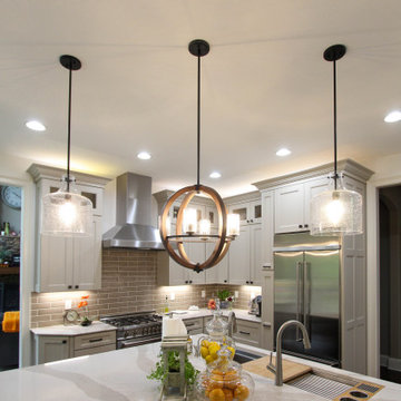White Kitchen with Espresso Island, Galley Sink, Cambria Britannica Countertop