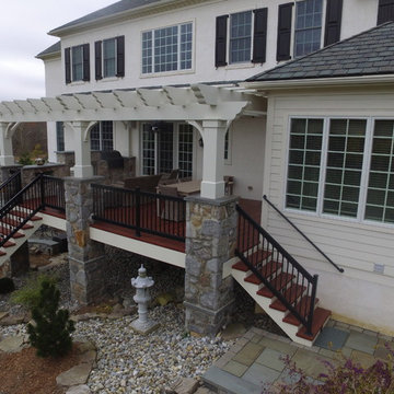 Zuri Deck with Cedar Pergola and Stone Fireplace with Grill