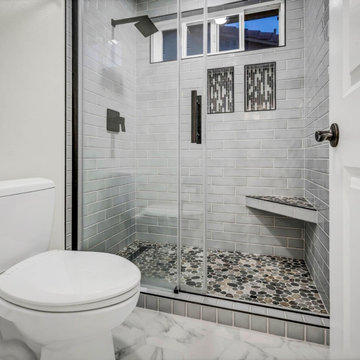 Modern Walk-In Shower With Mosaic Tile and Bench Seating in Aliso Viejo