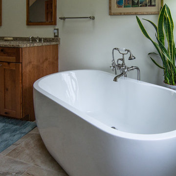 Master bath featuring a rustic character cherry vanity cabinet