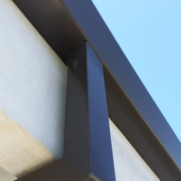 Costa Mesa, New Modern Home. Angle Face 5 inch Gutters, Smooth Downspouts.