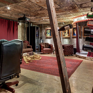 Small urban enclosed concrete floor home theater photo in Dallas with a projector screen
