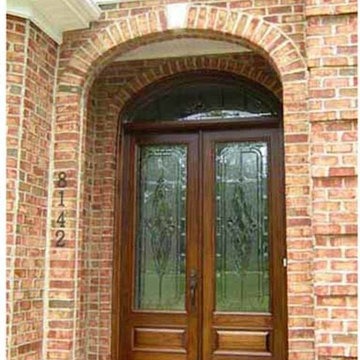 Mahogany entryway with decorative beveled glass