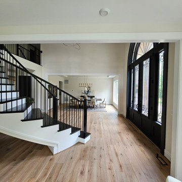 Project #130 | Curved Staircase with Wraparound Balcony