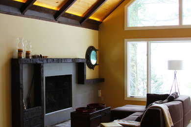 Example of a mid-sized trendy light wood floor and beige floor living room design in Wiltshire with beige walls, a standard fireplace, a tile fireplace and no tv