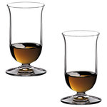 Riedel - Riedel Vinum Single Malt Whisky Glass - Set of 2 - In early 1992, a panel of Scotch whisky experts convened at Riedel's headquarters in Austria to test a range of nineteen different glass shapes. On the basis of this first selection, Georg Riedel undertook further research with the help of master distillers in Scotland. This research resulted in a glass that is an elongated thistle shape on a truncated stem. The design incorporates a small, slightly outturned lip which directs the spirit onto the tip of the tongue, where sweetness is perceived, and serves to emphasize the elegant creaminess of top quality single malt whisky. Recommended for: Malt Whisky, Single Malt Whisky, Whisky/Whiskey