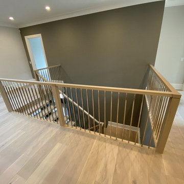 White Oak Stairs with Polished Stainless Steel Balusters