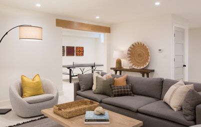 Shiplap, Oak Accents and Layers of Light Warm a Basement Design