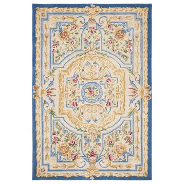 Safavieh Savonnerie 4' x 6' Hand Tufted Wool Rug in Blue and Ivory