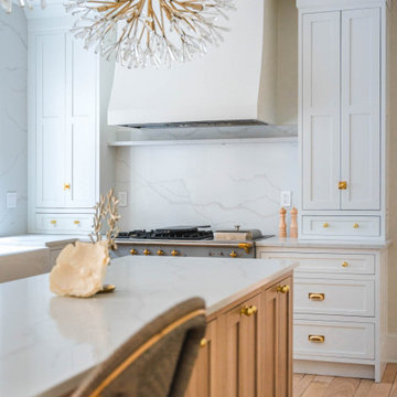 Château Charm: French-Inspired Kitchen Renovation with Plaster Hood Blue Stove a