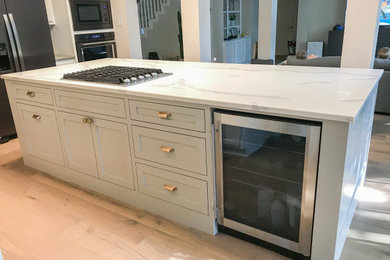 Large trendy kitchen photo in Houston with quartz countertops