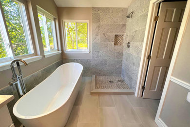 Example of a transitional bathroom design in Denver