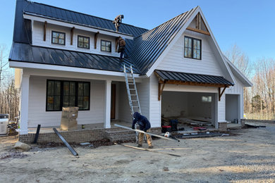 Inspiration for a farmhouse home design remodel in Other