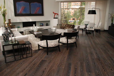 Example of a minimalist formal and open concept dark wood floor living room design in Other with no tv