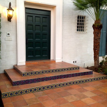 Terra Cotta and hand painted accent deco tile Installation