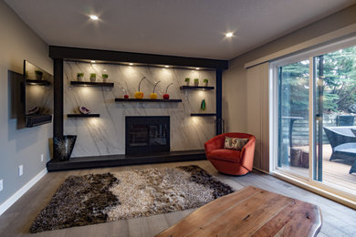 Design ideas for a modern family room in Calgary.