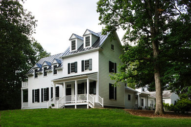 Example of a cottage exterior home design in Other
