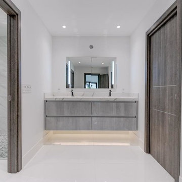 Modern complete renovation with custom wall panel and bedroom sets