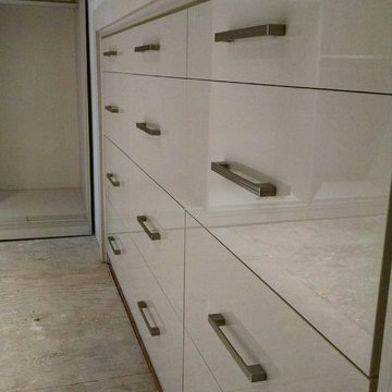 Contemporary Master Closet in high-gloss white and linen finish