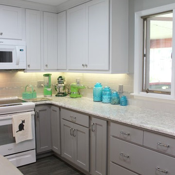 White Upper Cabinet and Gray Base Cabinet Kitchen With Quartz Counters