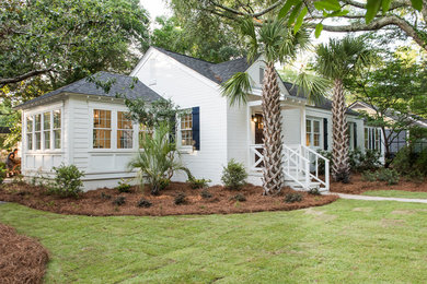Mid-sized elegant white one-story vinyl gable roof photo in Charleston