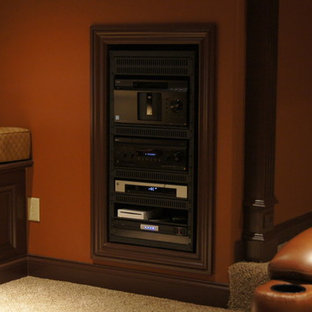 Photo of a medium sized classic enclosed home cinema in Other with brown walls and carpet.