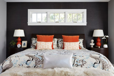 Design ideas for a mid-sized contemporary master bedroom in Chicago with black walls and carpet.