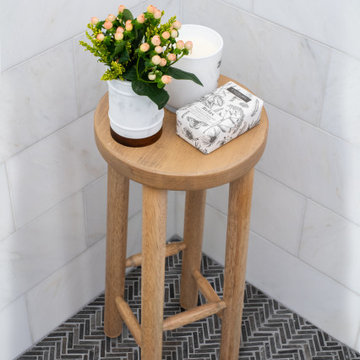 Walk-in Shower Design with Bold Pan Geometric Tile and Bright Marble Walls